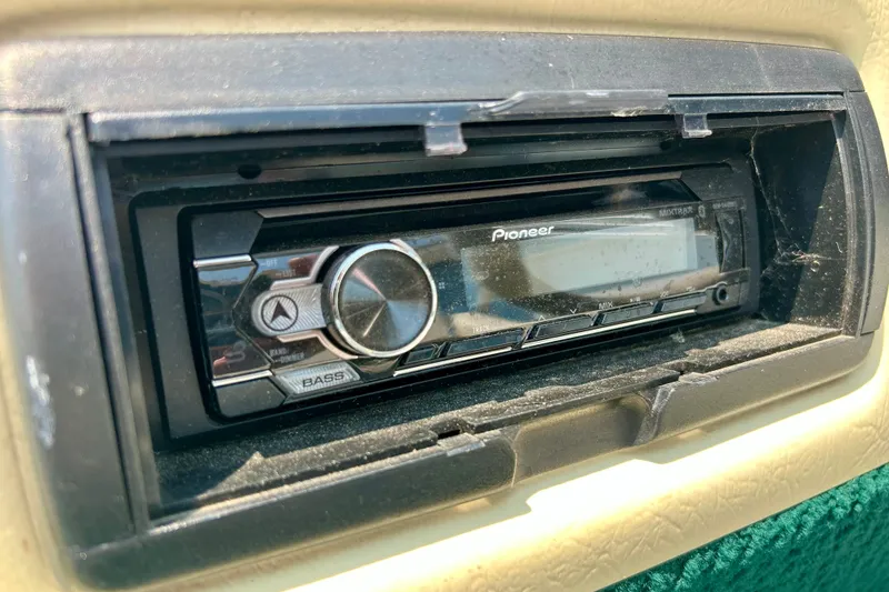 Slide: The Image of Pioneer stereo system in a 2003 Misty Harbor 2080CF boat dashboard. - 24