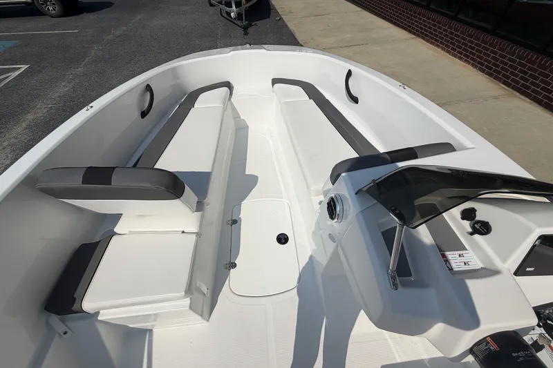 Slide: The Image of 2027 Tahoe T16 boat interior with sleek seating and modern dashboard design. - 11