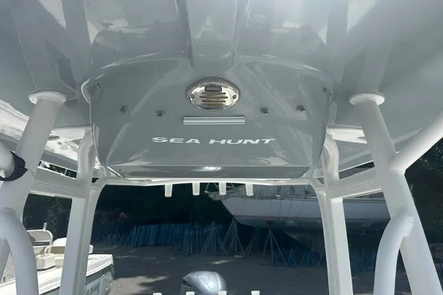 Slide: The Image of 2013 Sea Hunt Ultra 234 boat interior, featuring sleek design and sturdy construction. - 11