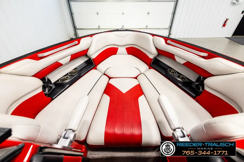 Slide: The Image of Interior of 2017 Malibu Wakesetter 25 LSV boat with red and white seating. - 16
