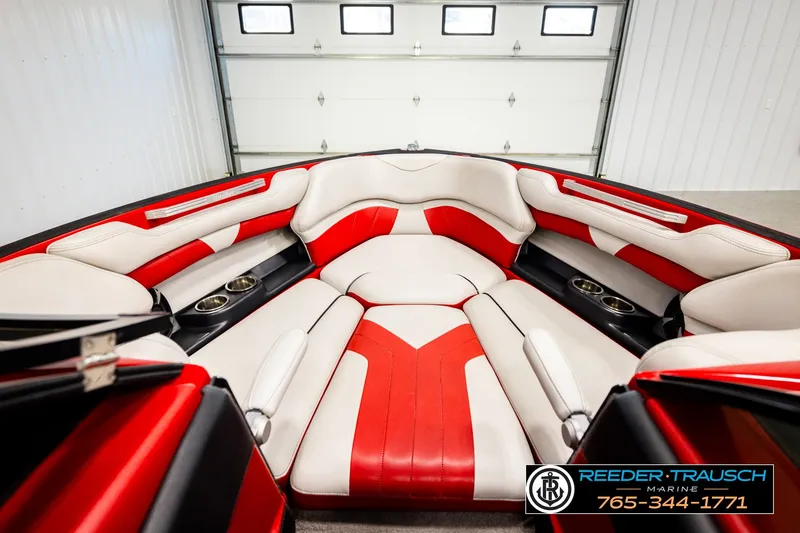 Slide: The Image of 2017 Malibu Wakesetter 25 LSV boat interior with red and white seating. - 32
