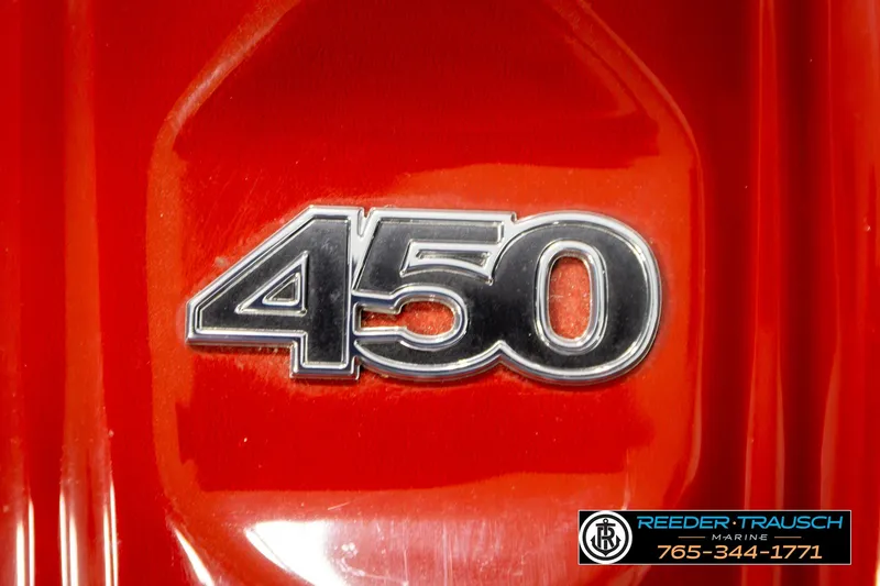 Slide: The Image of Red Malibu Wakesetter 25 LSV 2017 with '450' emblem detail. - 23