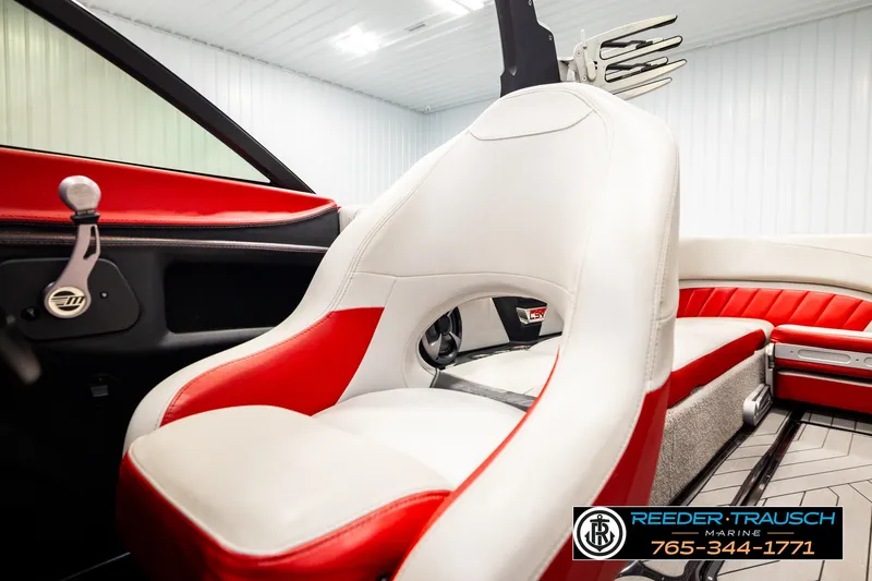 Slide: The Image of 2017 Malibu Wakesetter 25 LSV interior with red and white seating, sleek design. - 41