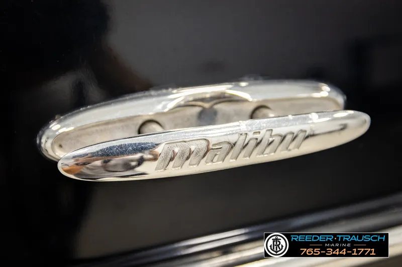 Slide: The Image of Chrome handle with "Malibu" logo on a 2017 Wakesetter 25 LSV boat. - 63