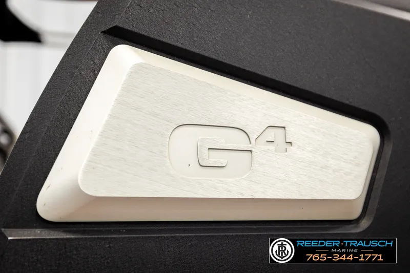 Slide: The Image of Close-up of 2017 Malibu Wakesetter 25 LSV G4 logo on a sleek surface. - 62