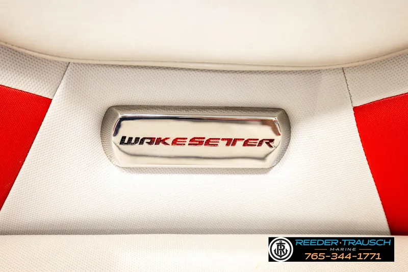 Slide: The Image of 2017 Malibu Wakesetter 25 LSV interior detail with logo and red accents. - 48