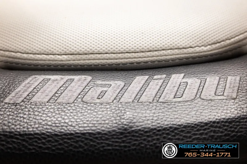 Slide: The Image of 2017 Malibu Wakesetter 25 LSV interior detail with logo and textured upholstery. - 42