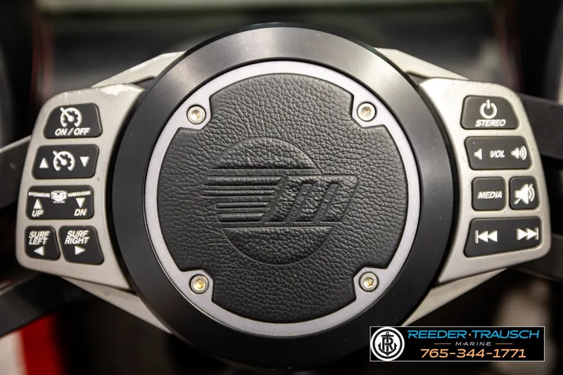 Slide: The Image of Steering wheel controls of a 2017 Malibu Wakesetter 25 LSV boat. - 35