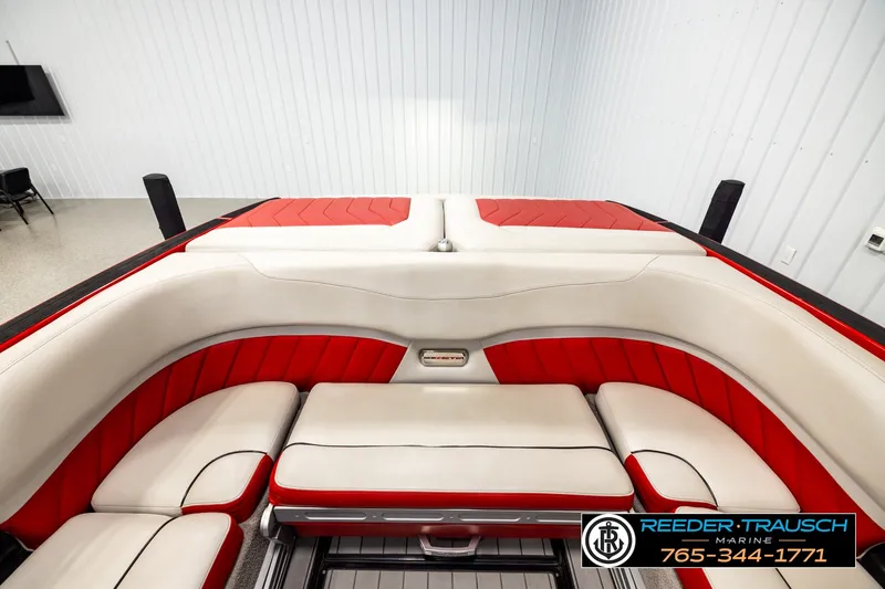 Slide: The Image of 2017 Malibu Wakesetter 25 LSV boat interior with red and white seating. - 19