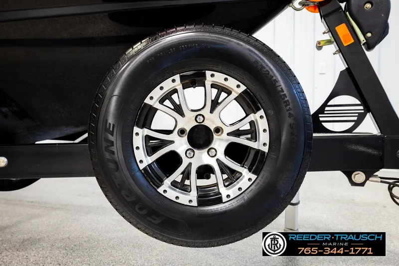 Slide: The Image of Close-up of a 2017 Malibu Wakesetter 25 LSV trailer wheel with Fortune tire. - 58