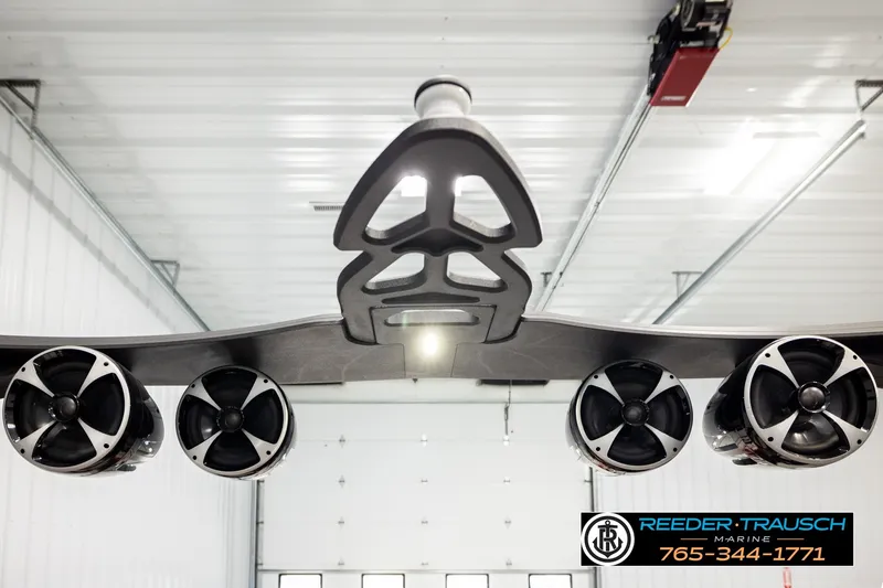 Slide: The Image of 2017 Malibu Wakesetter 25 LSV tower speakers in a showroom, Reeder Trausch Marine. - 49