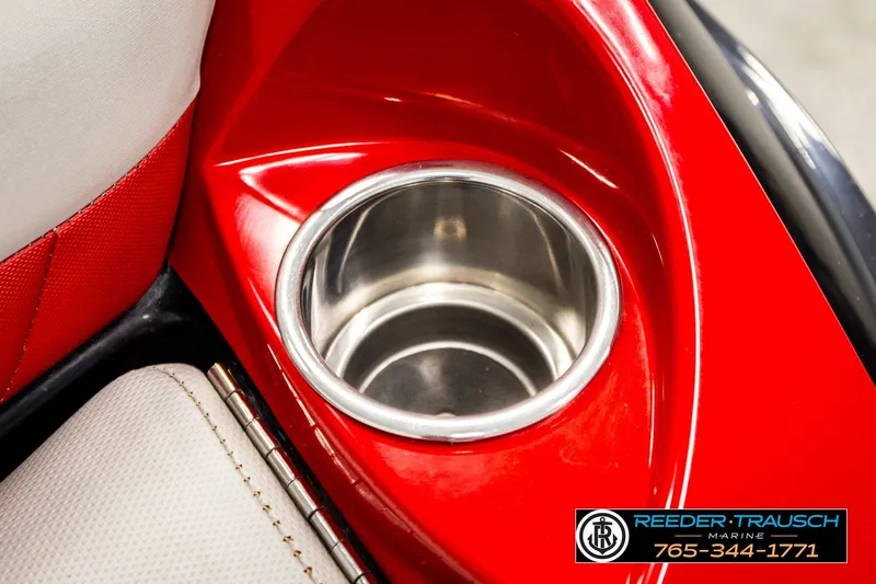 Slide: The Image of Red interior cup holder in 2017 Malibu Wakesetter 25 LSV boat. - 52