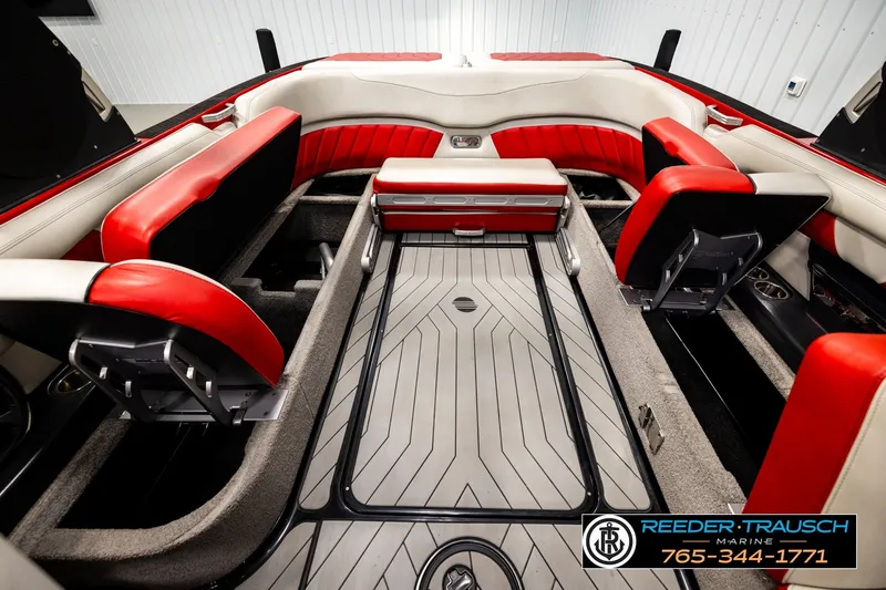 Slide: The Image of Interior of a 2017 Malibu Wakesetter 25 LSV boat with red and white seating. - 29