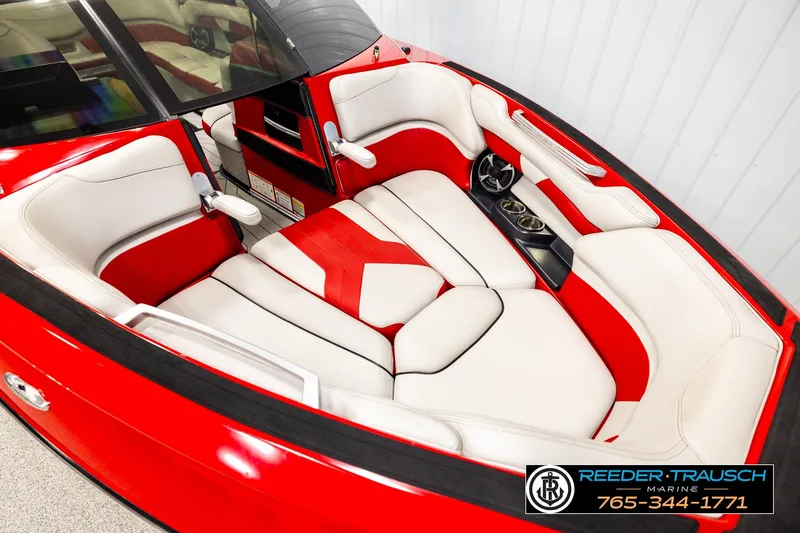 Slide: The Image of Luxurious interior of 2017 Malibu Wakesetter 25 LSV boat with red and white seating. - 9