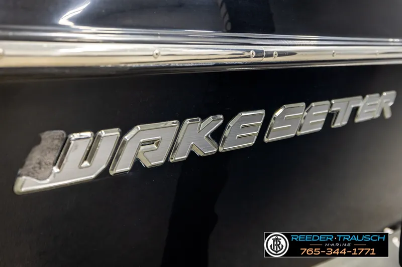 Slide: The Image of 2017 Malibu Wakesetter 25 LSV boat logo with Reeder-Trausch Marine branding. - 60