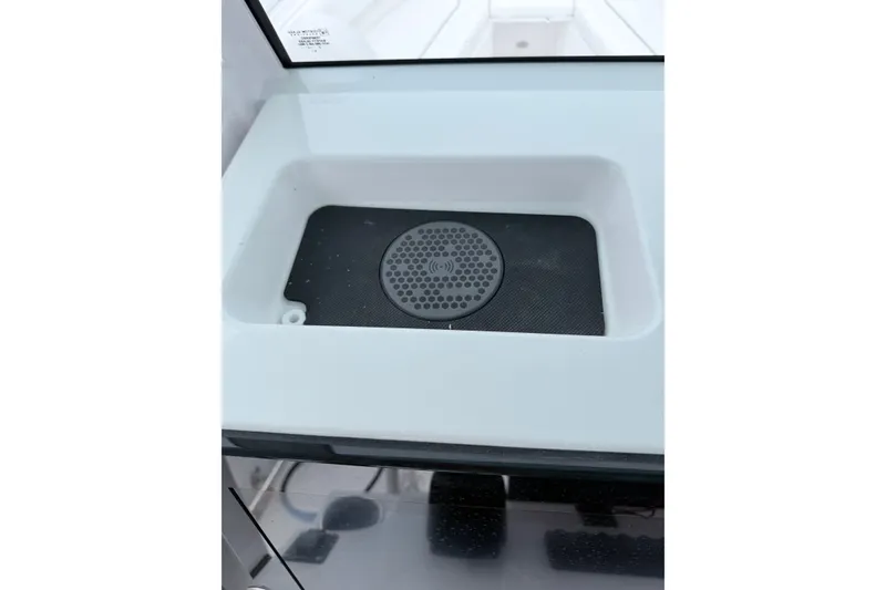 Slide: The Image of 2024 Sportsman Open 232 Center Console sink with integrated drainage system. - 17