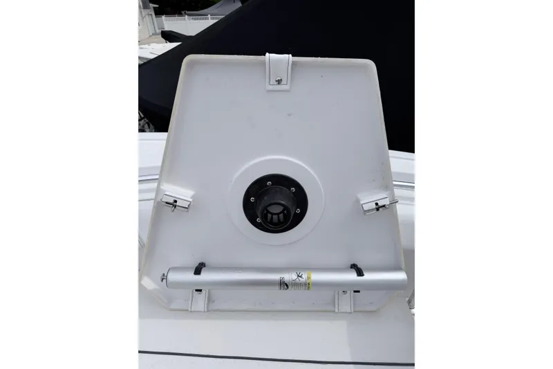 Slide: The Image of 2024 Sportsman Open 232 Center Console boat hatch detail. - 24