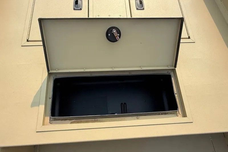 Slide: The Image of Open storage compartment on 2026 Crestliner 1860 Retriever Deluxe boat. - 10