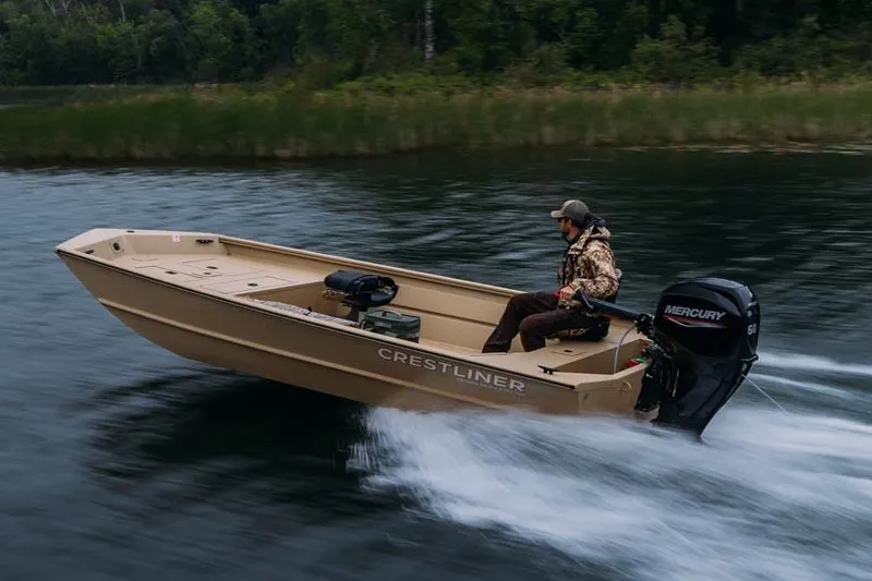 Slide: The Image of Manufacturer Provided Image: 2026 Crestliner 1860 Retriever Deluxe boat speeding on a lake with Mercury engine. - 14