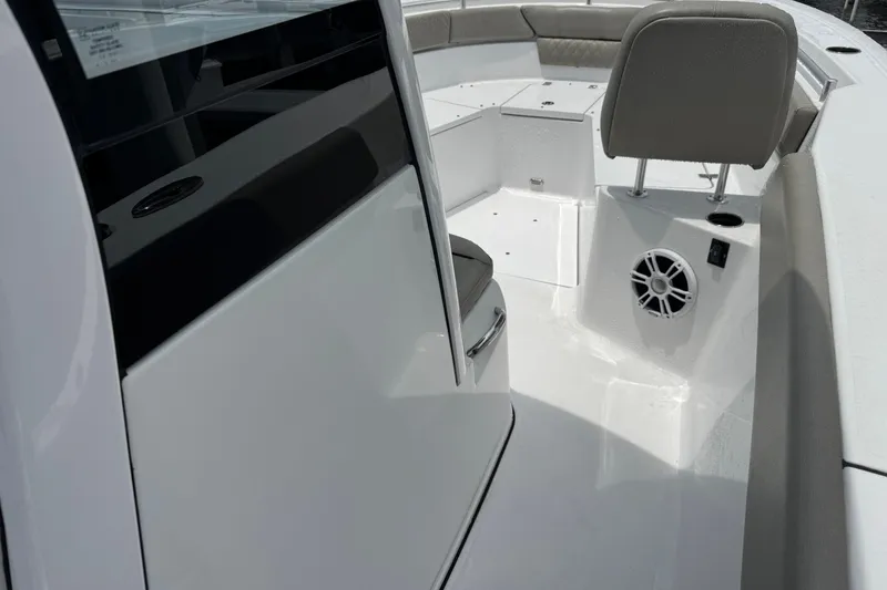 Slide: The Image of 2024 Sportsman Heritage 261 Center Console interior with seating and speaker detail. - 17