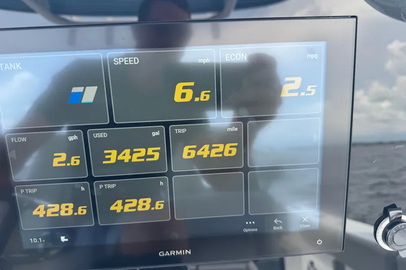 Slide: The Image of Display screen on 2024 Sportsman Heritage 261 Center Console showing speed and fuel data. - 15