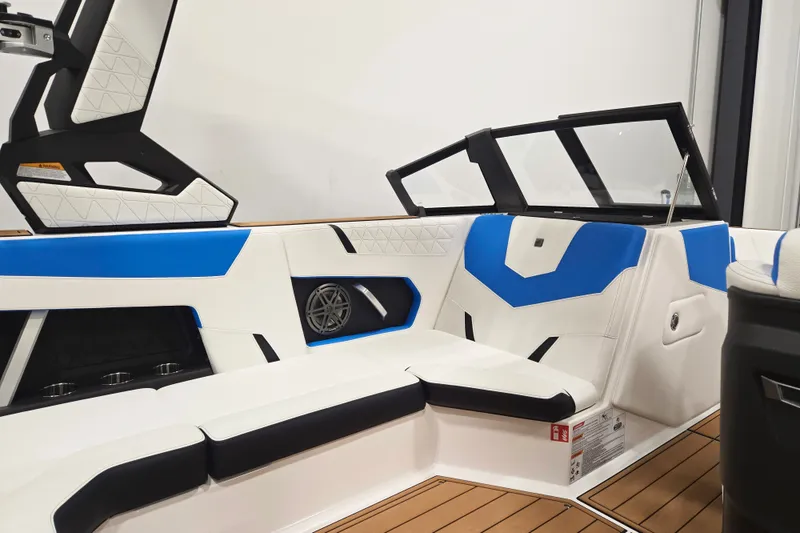 Slide: The Image of Interior of 2027 Nautique Super Air Nautique GS20 with blue and white seating. - 5