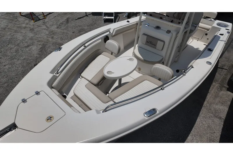 Slide: The Image of 2018 Sea Chaser 22 HFC boat interior with seating and table, showcasing luxury design. - 7