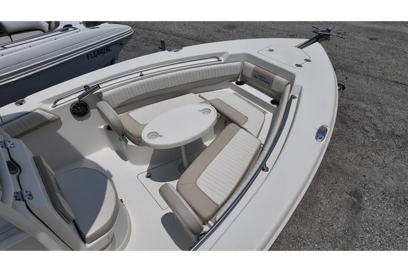 Slide: The Image of 2018 Sea Chaser 22 HFC boat interior with seating and table. - 6
