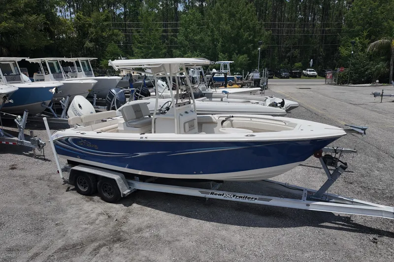 The Image of 2018 Sea Chaser 22 HFC boat on trailer, parked in a marina lot. - 0