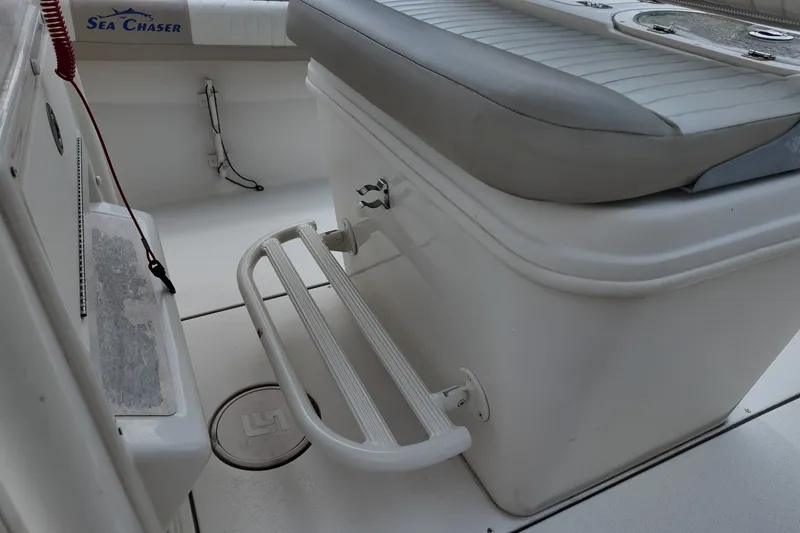 Slide: The Image of 2018 Sea Chaser 22 HFC boat interior with seating and step detail. - 15