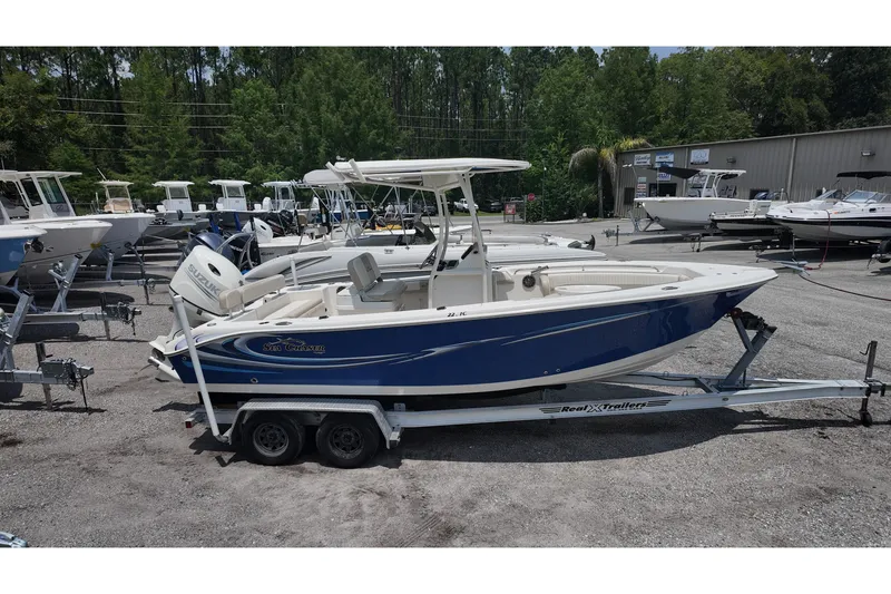 Slide: The Image of 2018 Sea Chaser 22 HFC boat on trailer in outdoor dealership lot. - 1