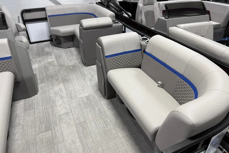 Slide: The Image of Luxurious interior of 2025 Qwest 8518 LANAI LT pontoon boat with modern seating. - 3