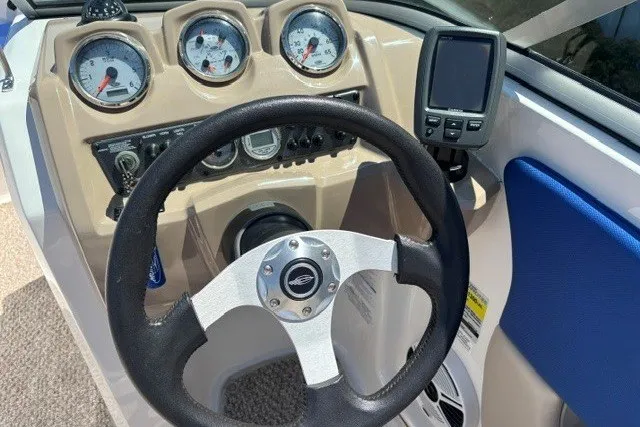 Slide: The Image of Steering wheel and dashboard of 2012 Chaparral 19 H2O Ski & Fish boat. - 3