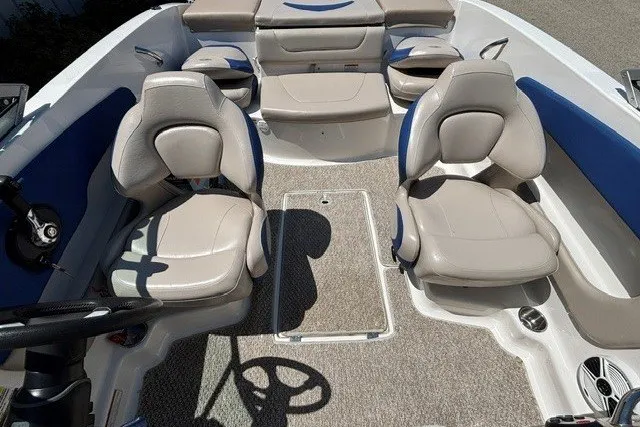Slide: The Image of Interior of 2012 Chaparral 19 H2O Ski & Fish boat with beige seating. - 10