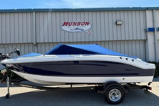 Slide: The Image of 2012 Chaparral 19 H2O Ski & Fish boat with blue cover on trailer. - 2