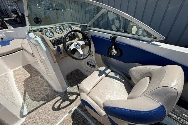 Slide: The Image of 2012 Chaparral 19 H2O Ski & Fish boat interior with steering wheel and dashboard. - 5