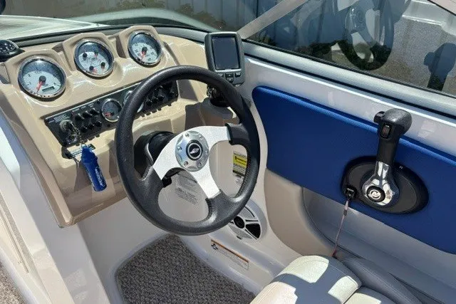 Slide: The Image of 2012 Chaparral 19 H2O Ski & Fish dashboard with steering wheel and gauges. - 4