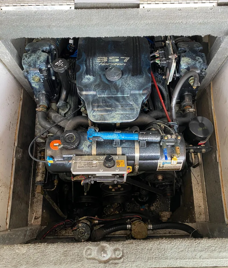 Slide: The Image of Engine compartment of a 1990 MasterCraft Maristar 240 with a 5.7-liter engine. - 17