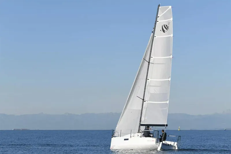 The Image of Manufacturer Provided Image: 2026 Beneteau First 27 SE sailboat on calm blue sea under clear sky. - 1