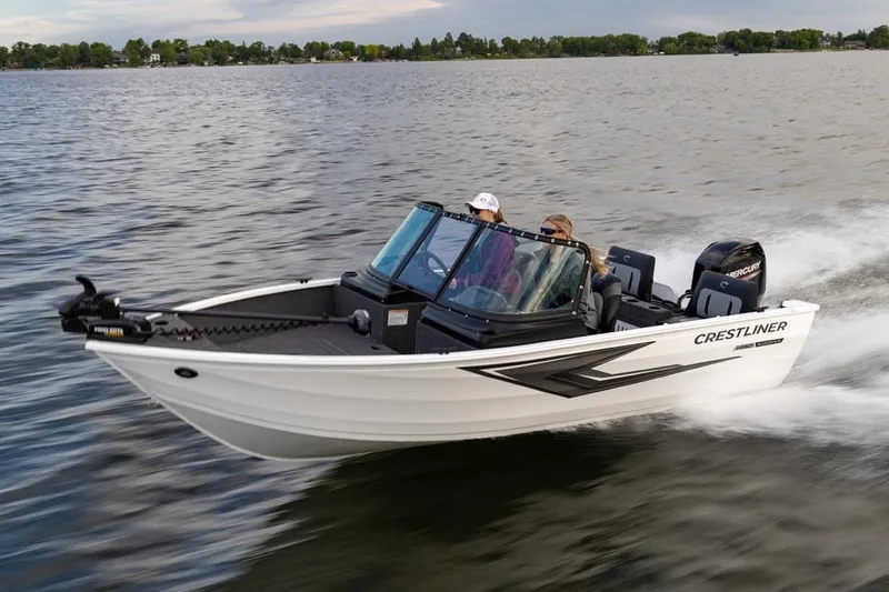The Image of Manufacturer Provided Image: 2026 Crestliner 1650 Kodiak WT boat cruising on a lake with passengers. - 0