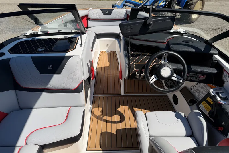 Slide: The Image of 2020 Nautique Super Air Nautique GS20 interior with sleek design and modern dashboard. - 9