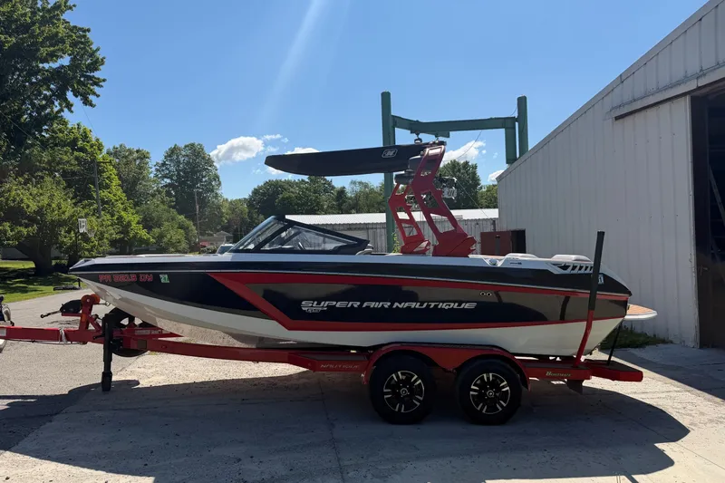 Slide: The Image of 2020 Nautique Super Air Nautique GS20 boat on trailer, parked outdoors. - 5