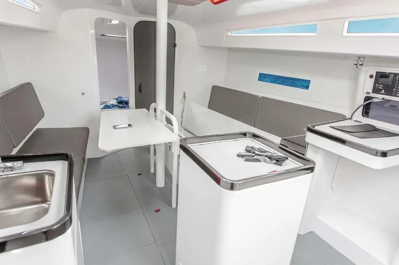 Slide: The Image of Manufacturer Provided Image: Modern interior of 2026 Beneteau FIRST 36 SE yacht with sleek design and compact amenities. - 4
