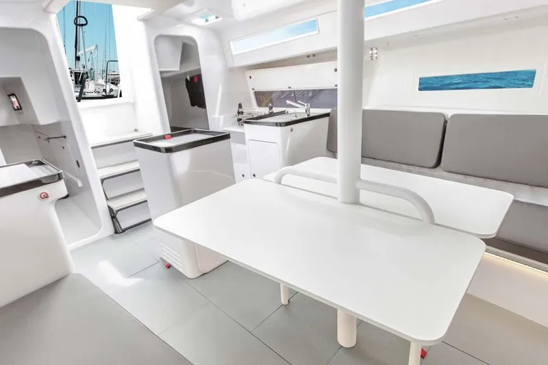 Slide: The Image of Manufacturer Provided Image: Modern interior of 2026 Beneteau FIRST 36 SE sailboat, featuring sleek design and comfortable seating. - 2
