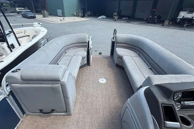 Slide: The Image of The image shows the interior of a 2019 Ranger Reata 200C with gray seating. - 7