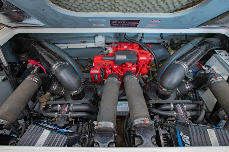 Slide: The Image of Engine compartment of a 2001 Sea Ray Sundancer 310 boat, showcasing mechanical components. - 38