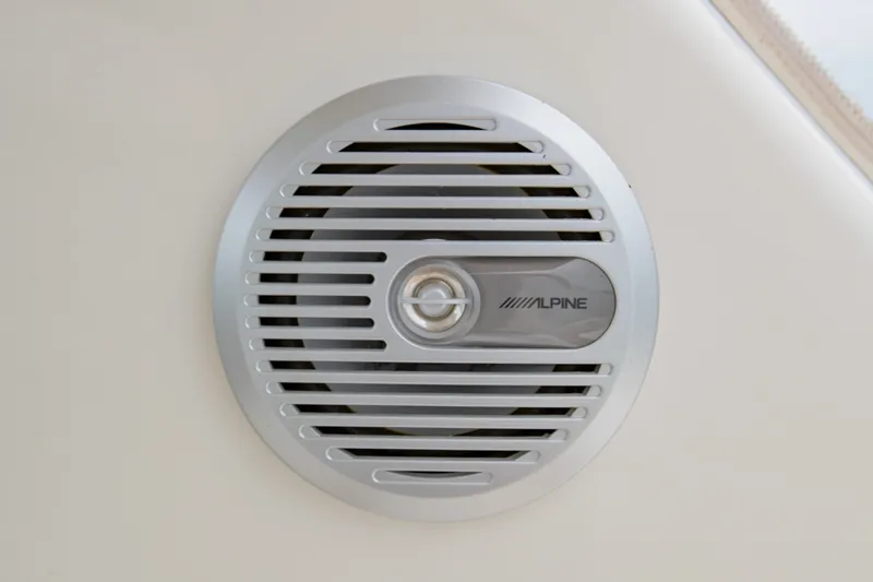 Slide: The Image of Alpine speaker on 2001 Sea Ray Sundancer 310 boat interior. - 17