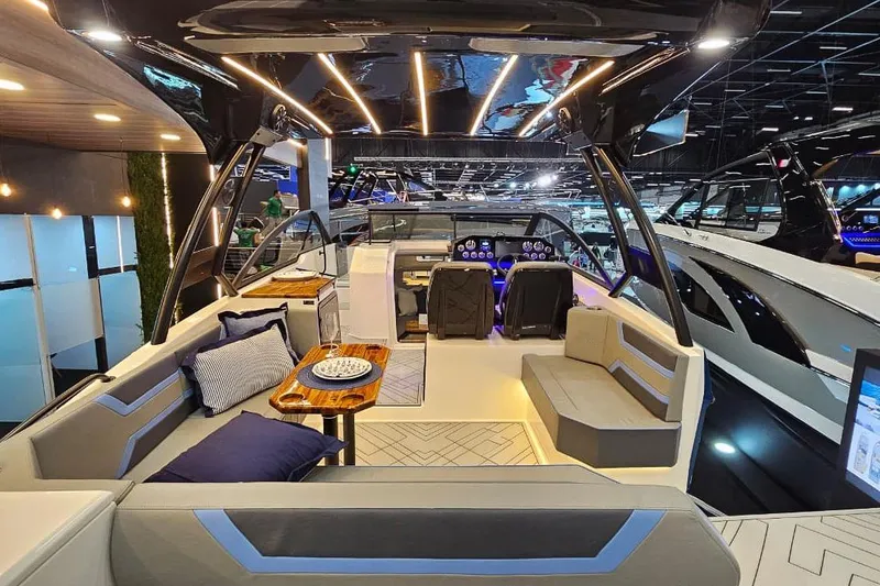 Slide: The Image of Luxurious 2026 Hanover 327 yacht interior with modern seating and elegant lighting. - 15