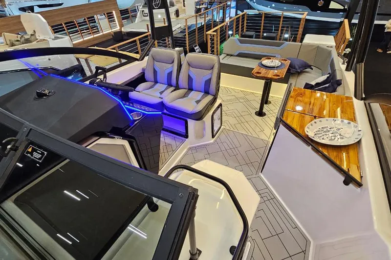 Slide: The Image of Luxurious interior of 2026 Hanover 327 boat with modern seating and elegant design. - 17