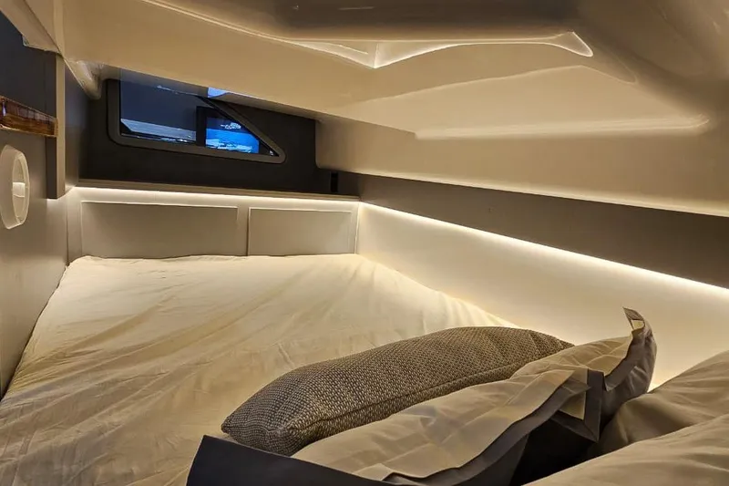 Slide: The Image of Luxurious interior of 2026 Hanover 327, featuring a cozy bed and ambient lighting. - 8
